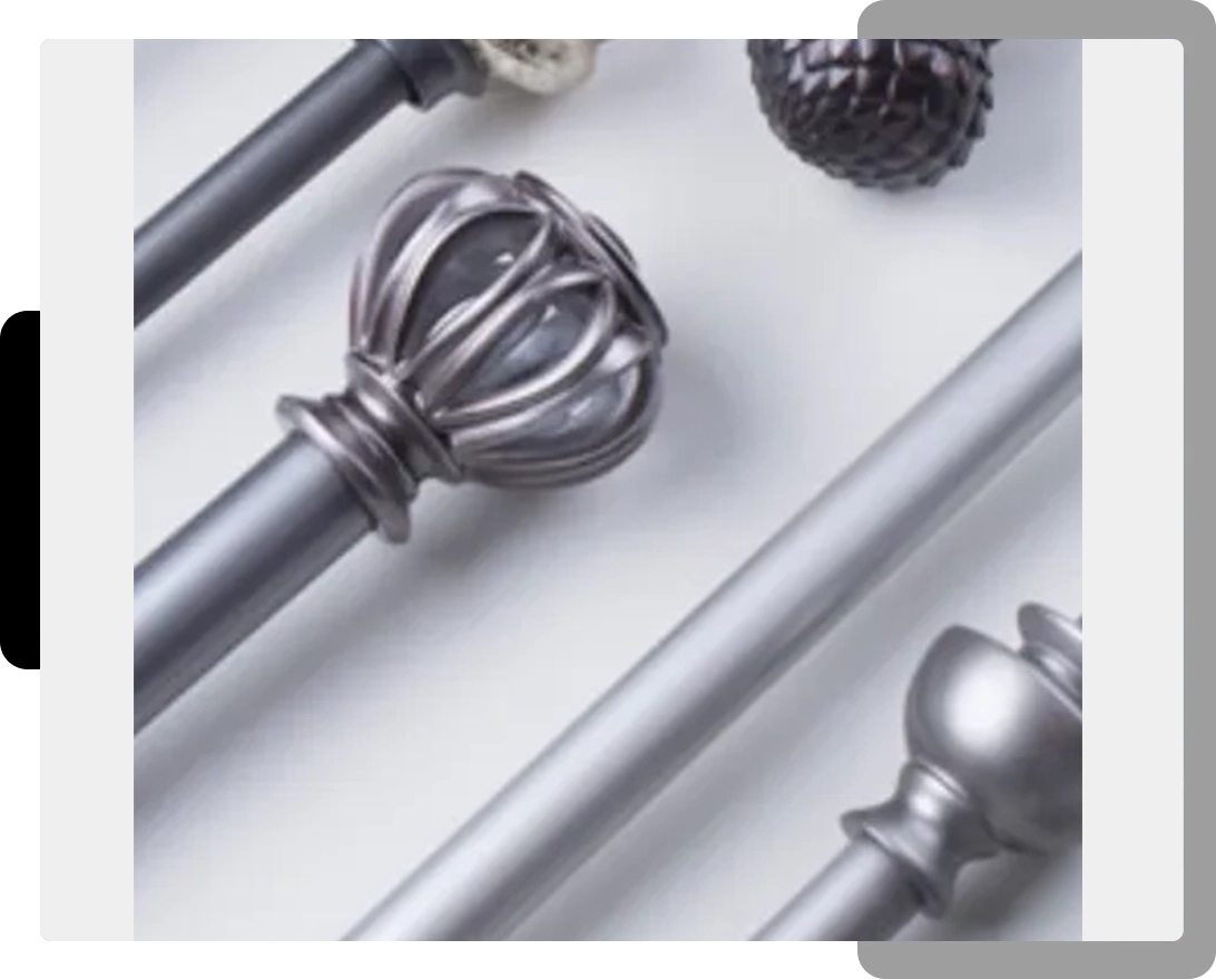 A close up of various metal curtain rods