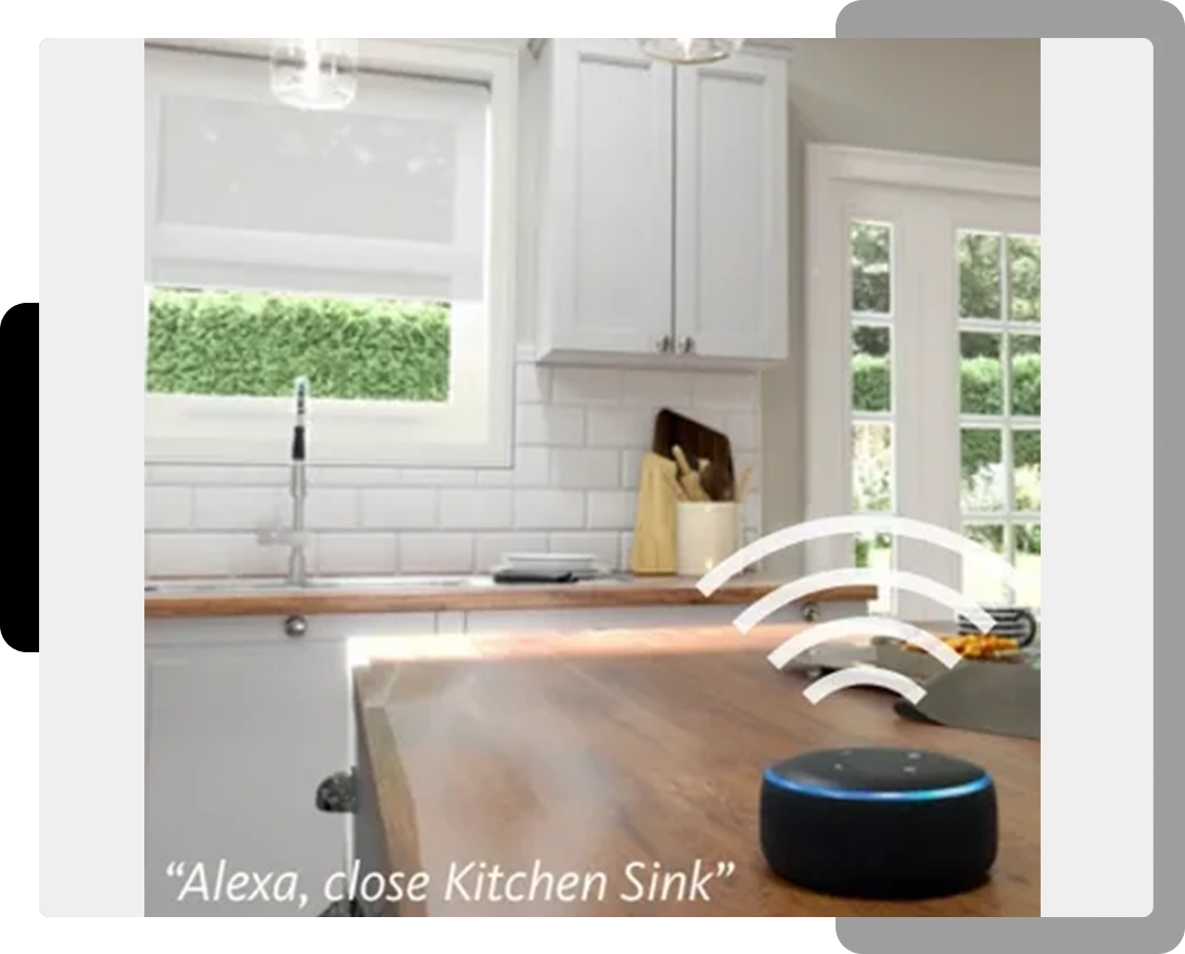 A kitchen with an alexa device on the counter.