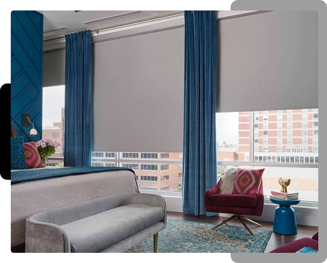 A living room with blue curtains and white walls