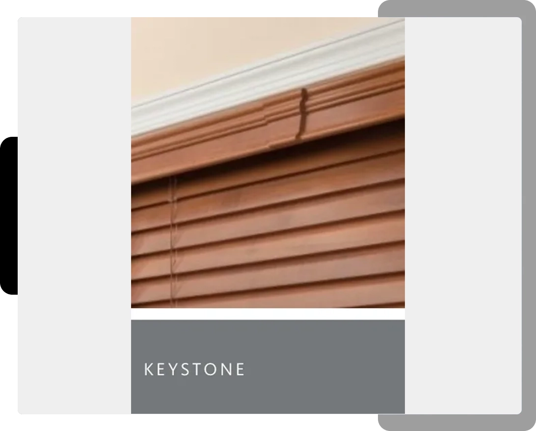 A close up of the keystone logo on a window.